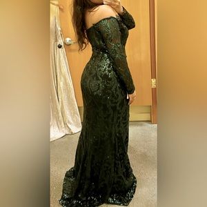 elegant emerald dress is perfect for special occasions & only been worn once.